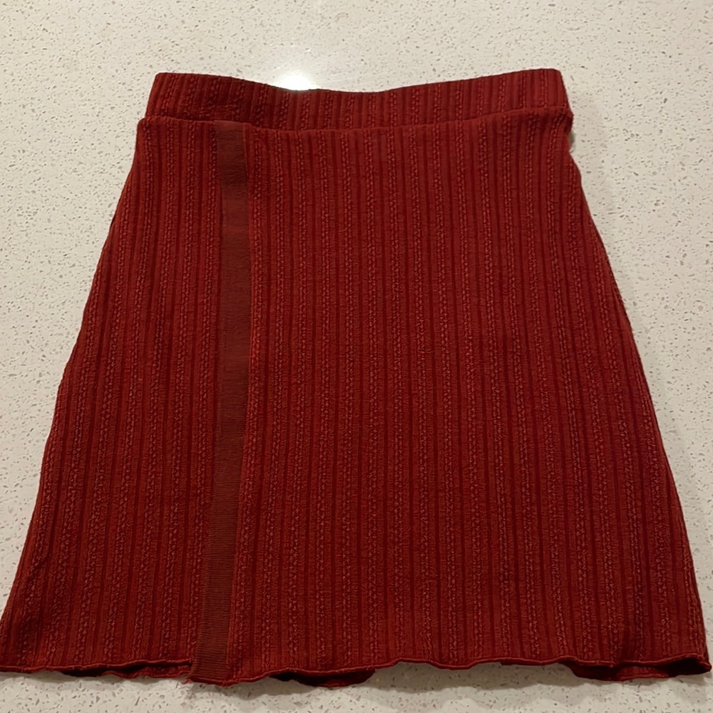 Red high waisted small skirt.